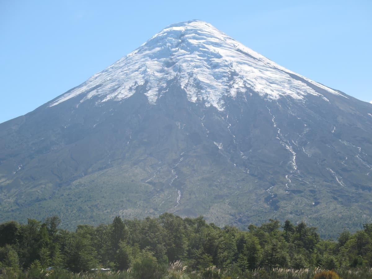 The snow-capped cone of Volcán Osorno above Lago Todos los Santos in Chile